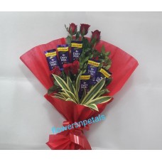 One Sided Hand Bunch with 6 red Roses & 6 Dairy milk chocolate & red Paper Packing